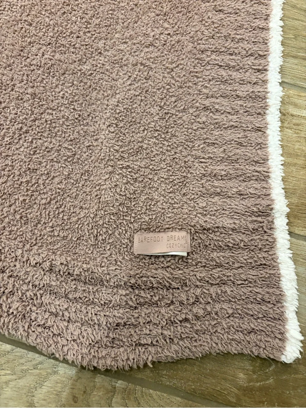 Barefoot Dreams CozyChic mauve pink throw